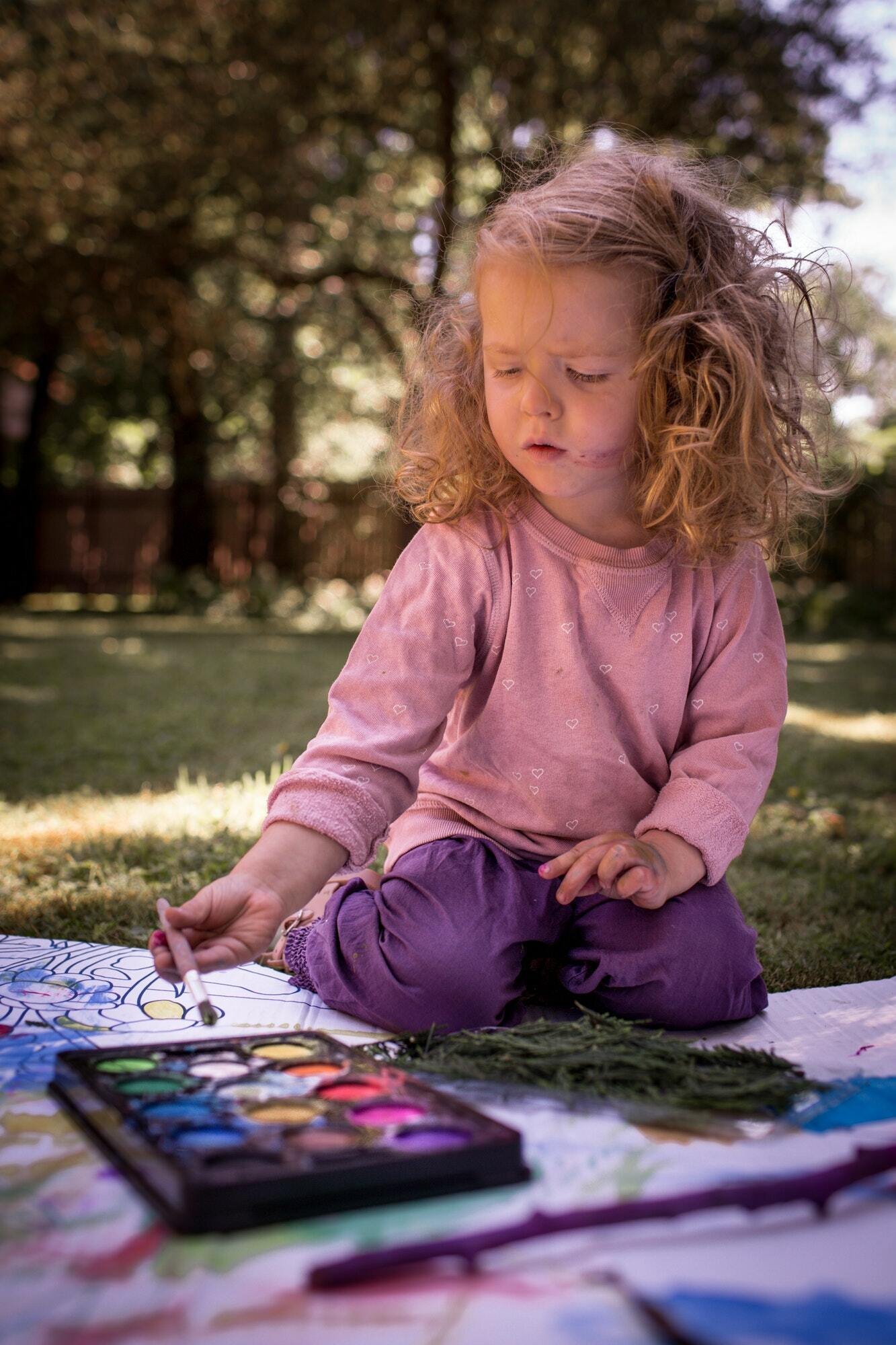 Little girl creating art